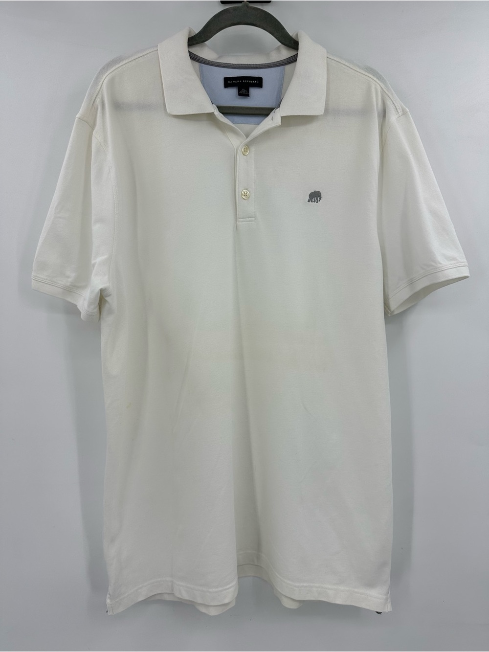 Banana Republic White Polo with Subtle Elephant Logo
